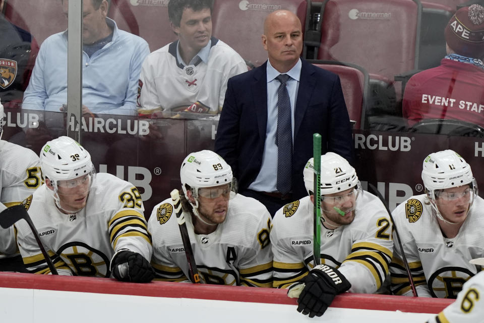Boston Bruins coach Jim Montgomery watches during the third period of Game 2 against the Florida Panthers in a second-round series of the NHL hockey Stanley Cup playoffs Wednesday, May 8, 2024, in Sunrise, Fla. (AP Photo/Lynne Sladky)