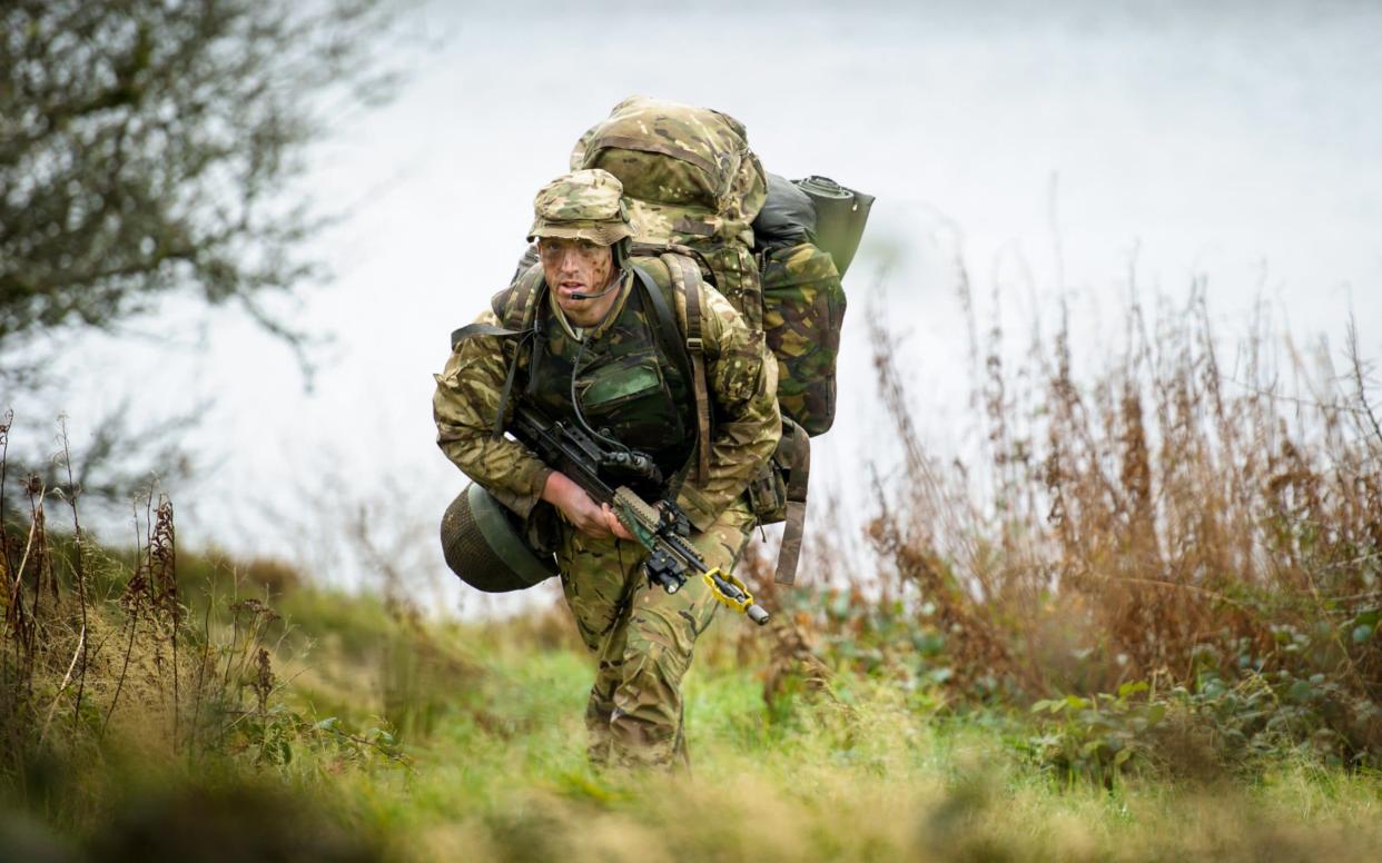 SAS hopefuls have to complete gruelling marches with heavy rucksacks - Anthony Upton