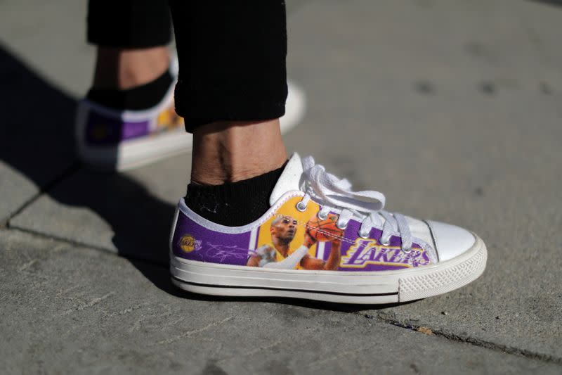 Kobe Bryant's fans gather at a memorial outside the Staples Center in Los Angeles