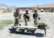 U.S. military advisers from the 1st Security Force Assistance Brigade hold firearms at an Afghan National Army base in Maidan Wardak province, Afghanistan August 6, 2018. Picture taken August 6, 2018. REUTERS/James Mackenzie