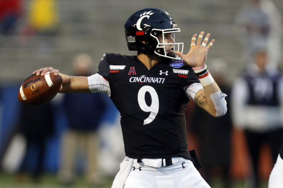 Cincinnati quarterback Desmond Ridder is a possible mid-round pick in 2021. (AP Photo/Butch Dill)