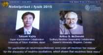 Portraits of Nobel Physics Prize winners Takaaki Kajita (L) and Arthur B. McDonald displayed on a screen during a press conference at the Swedish Academy of Sciences in Stockholm, on October 6, 2015