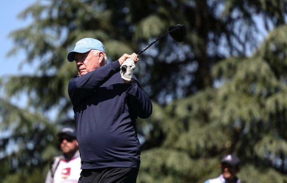 Mack Brown tees off at the Wells Fargo Championship Pro-Am in Charlotte, N.C., on Wednesday, May 3, 2023.