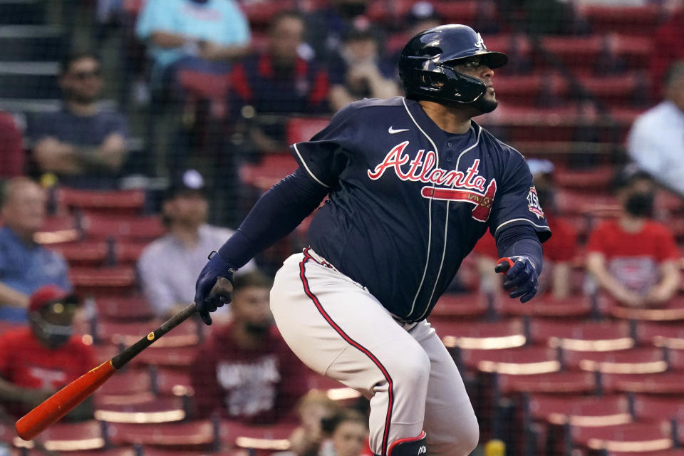 Atlanta Braves' Pablo Sandoval watches his single during the second inning of a baseball game against the Boston Red Sox at Fenway Park, Tuesday, May 25, 2021, in Boston. (AP Photo/Charles Krupa)