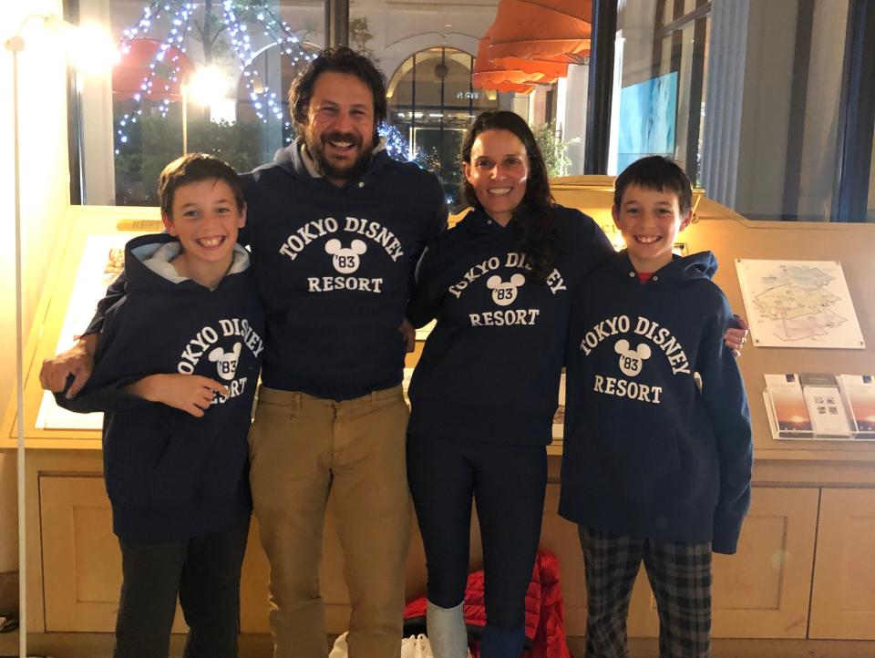 Ash Jurberg and his family at a Disney theme park in Tokyo, Japan.