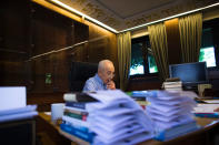 <p>Israel’s President Shimon Peres goes over his speech for the swearing-in ceremony of the new President, in his bureau at the presidential residence in Jerusalem, on his last day in office, July 24, 2014. (REUTERS/Ronen Zvulun) </p>