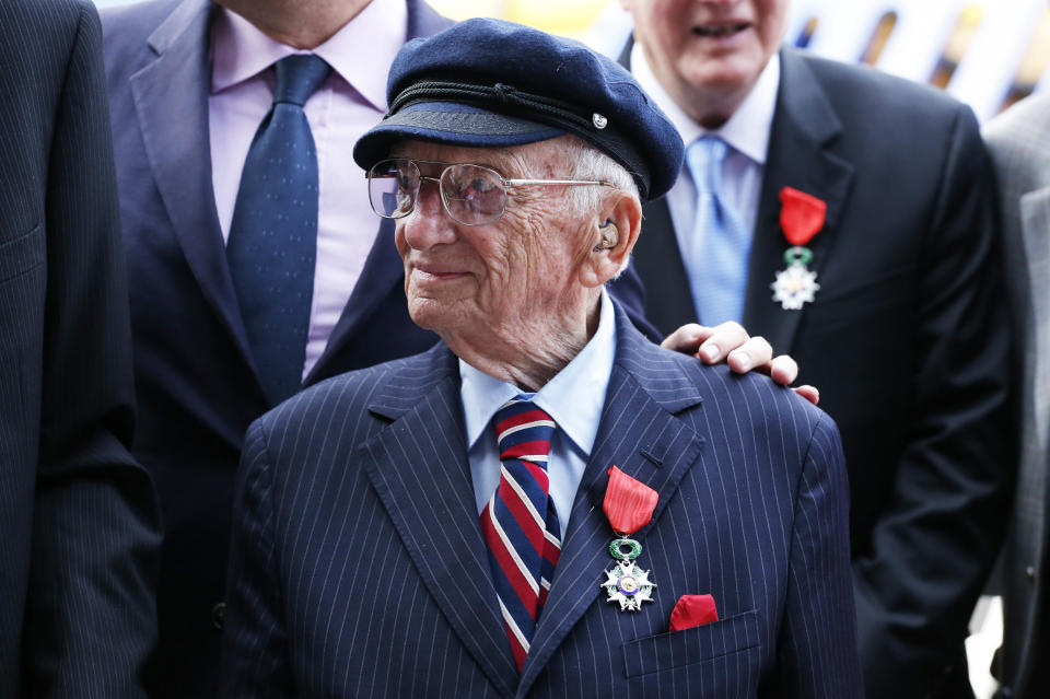 Benjamin Ferencz receives the Legion of Honor Insignia during an awards ceremony to honor World War II veterans  (Kena Betancur / AFP via Getty Images file)