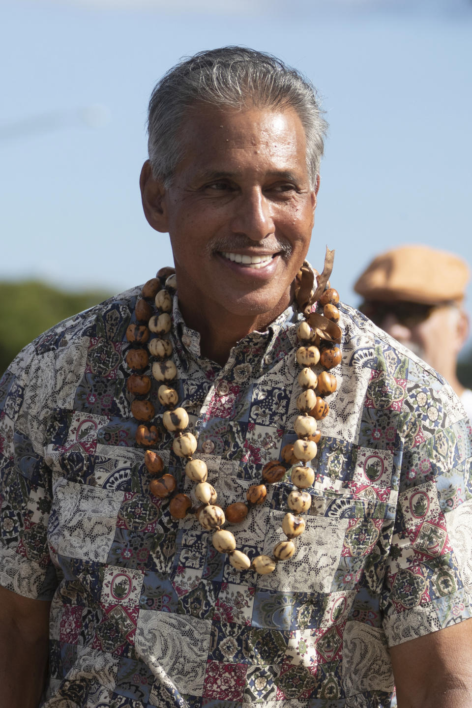 FILE - Hawaii Republican gubernatorial candidate Duke Aiona campaigns at the intersection of Fort Weaver Road and Laulaunui Street, in Ewa, Hawaii, on Friday Aug. 12, 2022. Aiona is running against Lt. Gov. Josh Green, a Democrat, in the Nov. 8, 2022 election.(George F. Lee/Honolulu Star-Advertiser via AP)