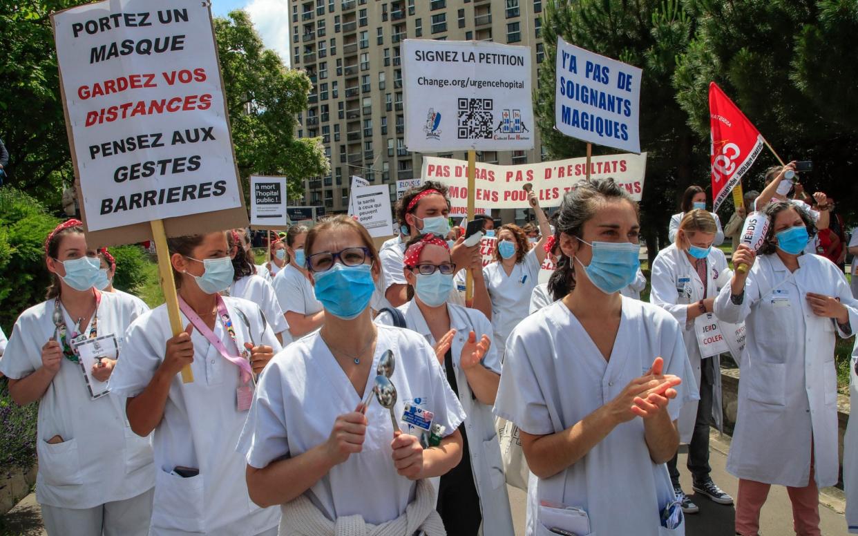 Medical personnel protest in Paris - AP Photo/Michel Euler