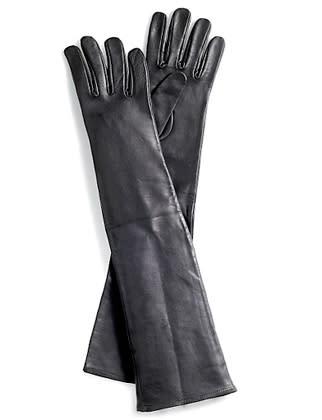 Supple leather elbow-length gloves add Old Hollywood glamour to a cropped-sleeve jacket.