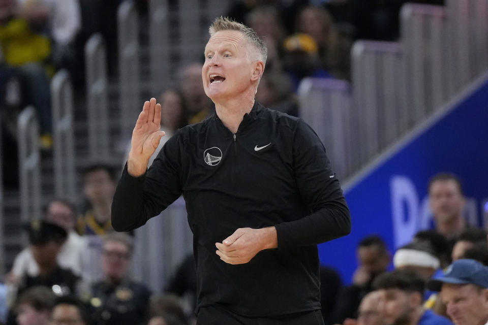 Golden State Warriors coach Steve Kerr gestures to players during the first half of the team's NBA basketball game against the Oklahoma City Thunder in San Francisco, Tuesday, April 4, 2023. (AP Photo/Jeff Chiu)