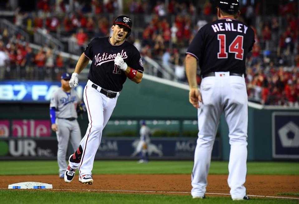 Washington Nationals' Ryan Zimmerman celebrates after hitting a three-run home run off Dodgers pitcher Pedro Baez.