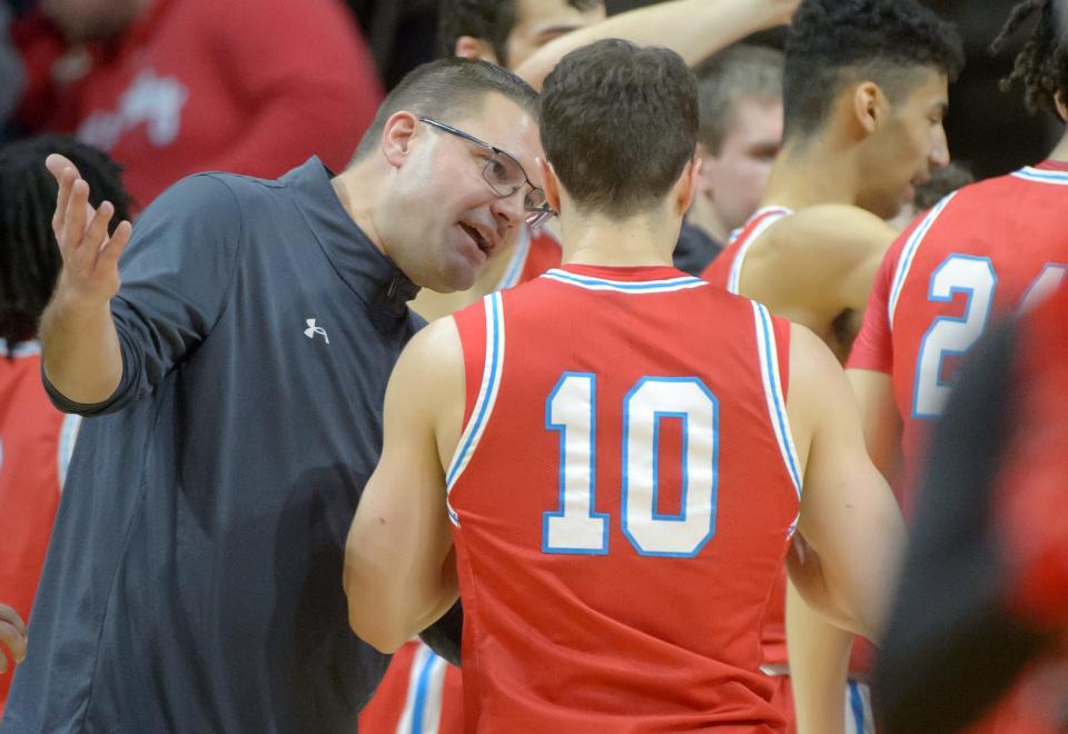 Bradley head coach Brian Wardle advises senior guard Connor Hickman during a break against Illinois State in the first half of their Missouri Valley Conference basketball game Saturday, Feb. 3, 2024 at CEFCU Arena in Normal.