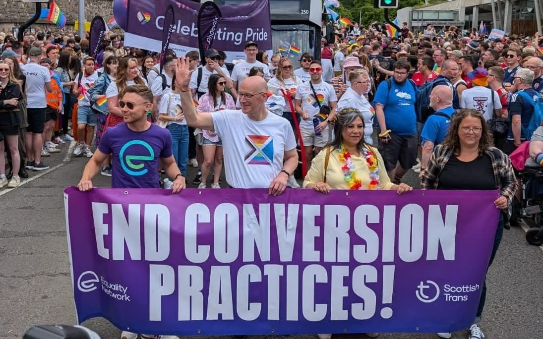 John Swinney (centre) at Edinburgh Pride in June