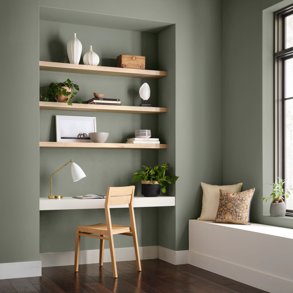 green-gray office with shelves