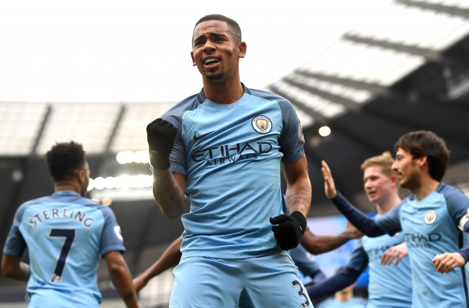 <p>Gabriel Jesus of Manchester City celebrates scoring his sides first goal during the Premier League match between Manchester City and Swansea City at Etihad Stadium on February 5, 2017 in Manchester, England </p>