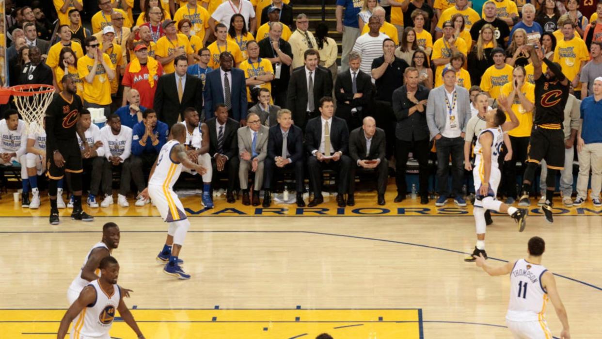 <div>Cleveland Cavaliers' Kyrie Irving (2) scores three points against Golden State Warriors' Stephen Curry (30) late in the fourth quarter of Game 7 of the NBA Finals at Oracle Arena in Oakland, Calif., on Sunday, June 19, 2016. (Nhat V. Meyer/Bay Area News Group) (Photo by MediaNews Group/Bay Area News via Getty Images)</div>