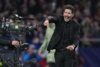 Atletico Madrid's head coach Diego Simeone celebrates at the end of the Champions League, round of 16, second leg soccer match against Inter Milan at the Metropolitano stadium in Madrid, Spain, Wednesday, March 13, 2024. Atletico Madrid won 3-2 in a penalty shootout. (AP Photo/Manu Fernandez)