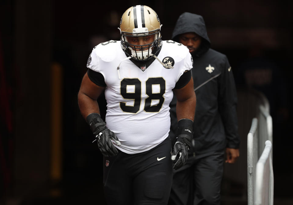 FILE – In this Dec. 9, 2018 file photo New Orleans Saints defensive tackle Sheldon Rankins (98) walks onto the field before an NFL football game against the Tampa Bay Buccaneers in <a class="link " href="https://sports.yahoo.com/nfl/teams/tampa-bay/" data-i13n="sec:content-canvas;subsec:anchor_text;elm:context_link" data-ylk="slk:Tampa;sec:content-canvas;subsec:anchor_text;elm:context_link;itc:0">Tampa</a>, Fla. Rankins could sit out this Sunday, Dec. 30, 2018 and still finish with the best single-season statistics of his career. He has been arguably New Orleans’ most improved player, and his emergence has helped the Saints capture the top seed in the NFC playoffs. (AP Photo/Mark LoMoglio, file)
