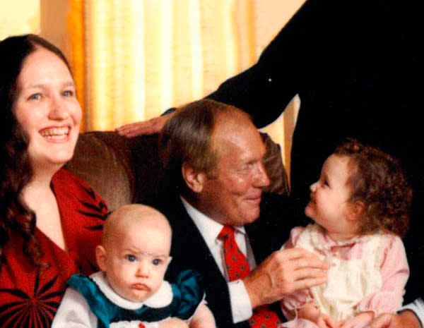 Megan Phelps-Roper seated on Westboro founder Fred Phelp's lap in 1988, with her mother and sister | Courtesy Megan Phelps-Roper