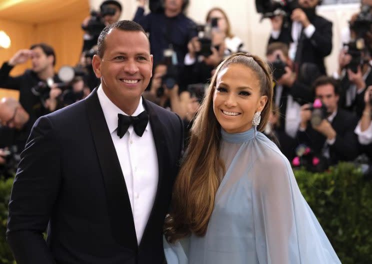 Alex Rodriguez, pictured with girlfriend Jennifer Lopez, is not ready to enter the picture as a potential owner in MLB. (AP)