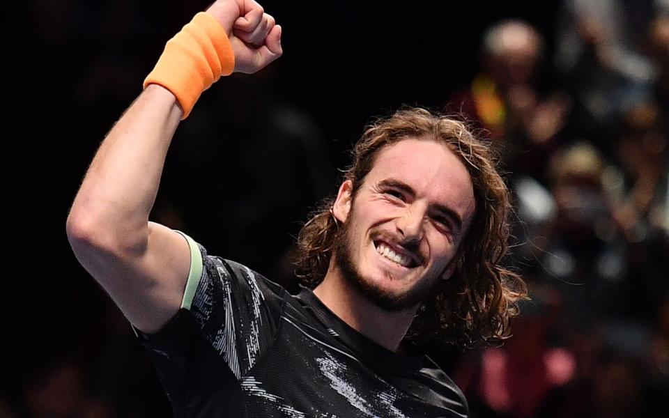 Stefanos Tsitsipas celebrates victory over Roger Federer - AFP