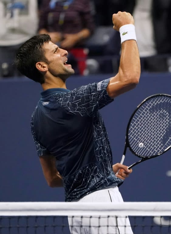 Iron man: Novak Djokovic celebrates victory over Kei Nishikori