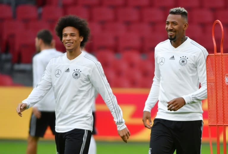 Jerome Boateng (R) with Leroy Sane was a key part of the Germany team that flopped in Russia