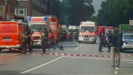 Security forces and ambulances after a knife attack in a supermarket in Hamburg, Germany, July 28, 2017 in this still image from a video obtained from social media. Twitter/Krakan Gargicz via REUTERS THIS IMAGE HAS BEEN SUPPLIED BY A THIRD PARTY. NO RESALES. NO ARCHIVES. MANDATORY CREDIT