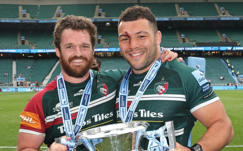 Julian Montoya and Ellis Genge of Leicester Tigers pose for a photograph with the Gallagher Premiership Trophy after the final whistle of the Gallagher Premiership Rugby Final match between Leicester Tigers and Saracens at Twickenham - GETTY IMAGES