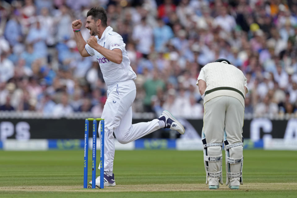 England's Josh Tongue, left, celebrates the dismissal of Australia's Steven Smith, right, during the fourth day of the second Ashes Test match between England and Australia, at Lord's cricket ground in London, Saturday, July 1, 2023. (AP Photo/Kirsty Wigglesworth)