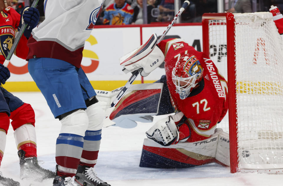 Florida Panthers goaltender Sergei Bobrovsky gives up a goal to Colorado Avalanche right wing Logan O'Connor during the first period of an NHL hockey game Saturday, Feb. 11, 2023, in Sunrise, Fla. (AP Photo/Reinhold Matay)