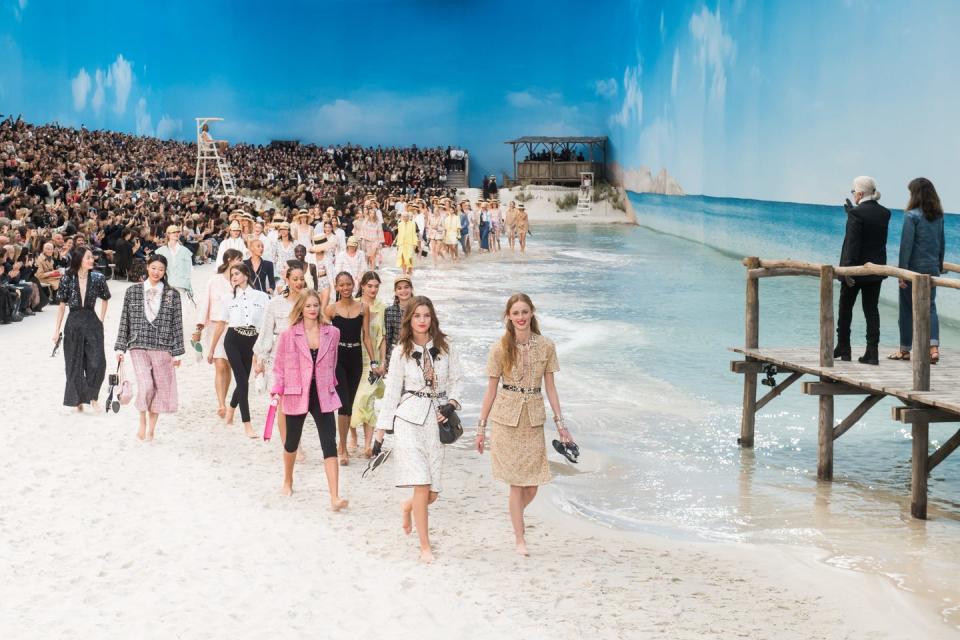 <p>Said to be inspired by Lagerfield's childhood years holidaying on the island of Sylt his SS19 beach set was complete with a jetty (from which Karl Lagerfeld watched the finale), beach huts, actual sand and real, lapping waves.</p>