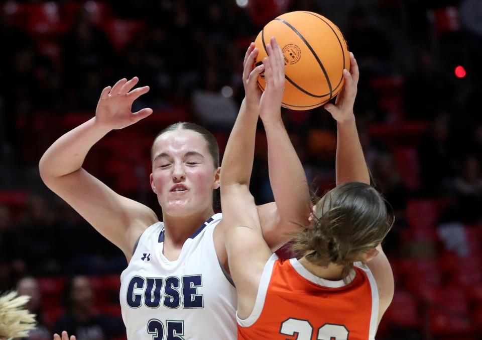 Syracuse’s Olivia Sorenson and Skyridge’s Jada Smith fight for the ball during a 6A girls quarterfinal basketball game at the Huntsman Center in Salt Lake City on Monday, Feb. 26, 2024. | Kristin Murphy, Deseret News