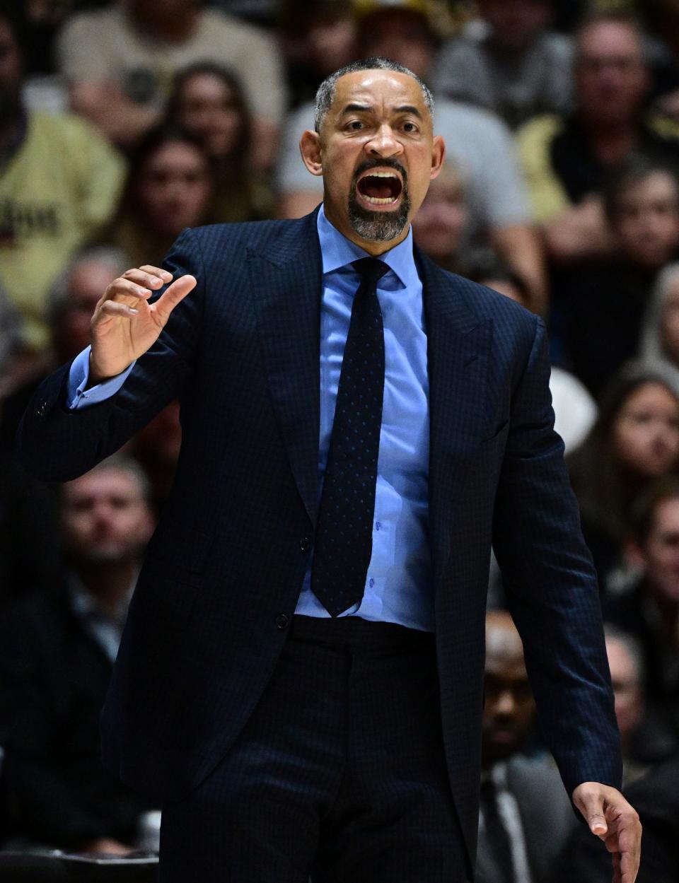 Michigan coach Juwan Howard yells toward his team during the first half vs. Purdue on Tuesday, Jan. 23, 2024, in West Lafayette, Indiana.
