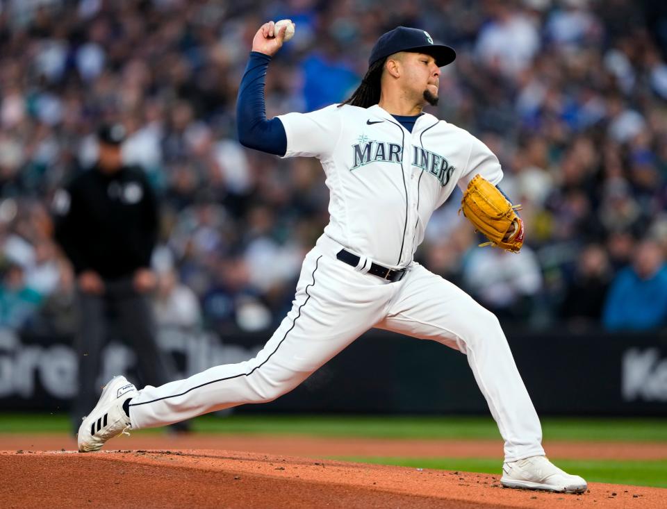 Seattle Mariners starting pitcher Luis Castillo throws to a Cleveland Guardians batter during the first inning of an opening day baseball game Thursday, March 30, 2023, in Seattle. (AP Photo/Lindsey Wasson)