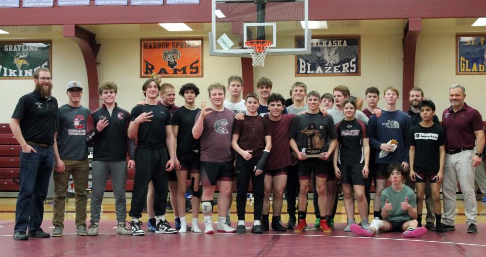 The Charlevoix wrestling team claimed a Division 4 team district title on their home floor this week, just days after adding a Lake Michigan Conference title to their resume this season.