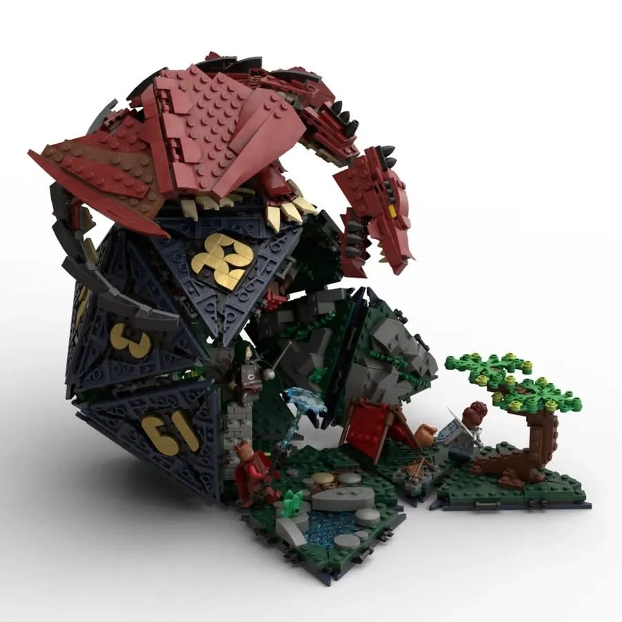 A twenty-sided die with a red dragon on top made of LEGO