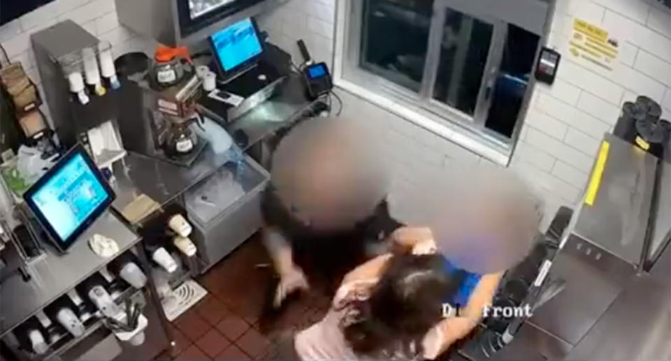 A woman was caught on camera punching and choking a McDonald’s manager in a row over ketchup. Source: Storyful