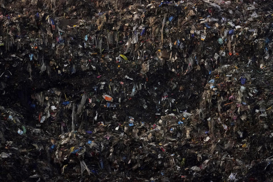 Shredded organic materials are piled up before being taken to a anaerobic digester at a GreenWaste Zanker Resource Recovery Facility in San Jose, Calif., Friday, Oct. 27, 2023. For the first time since the 1990s, the EPA updated its ranking of preferred strategies for waste reduction, ranging from preventing wasted food altogether (by not producing or buying it in the first place) to composting or anaerobic digestion, a process by which food waste can be turned into energy in the form of biogas. (AP Photo/Jeff Chiu)