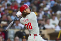 Philadelphia Phillies' Alec Bohm flies out during the fourth inning of the team's baseball game against the San Diego Padres, Saturday, April 27, 2024, in San Diego. (AP Photo/Brandon Sloter)