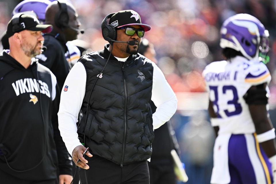 Oct 15, 2023; Chicago, Illinois, USA; Minnesota Vikings defensive coordinator Brian Flores watches his team play against the Chicago Bears at Soldier Field. Mandatory Credit: Jamie Sabau-USA TODAY Sports