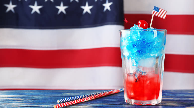 Layered cocktail in front of US flag