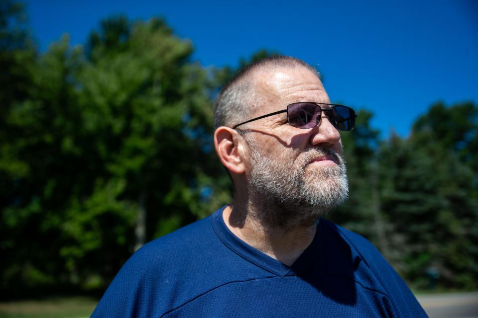 Holland resident Brent Johnson, 58, stands for portrait Wednesday, Aug. 10, at Family Fare in Holland Township.