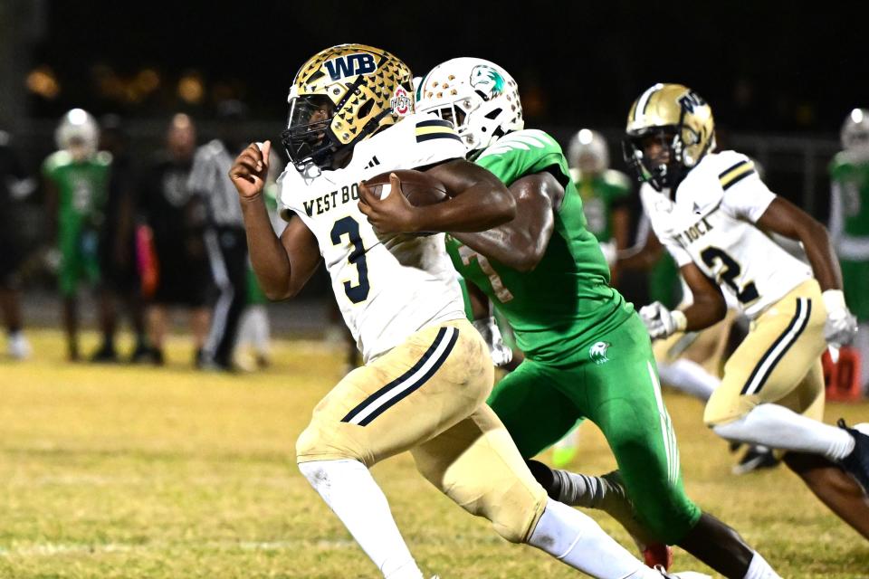 West Boca's Javian Mallory is off to the races with Atlantic defenders in tow on Nov. 10. 2023.