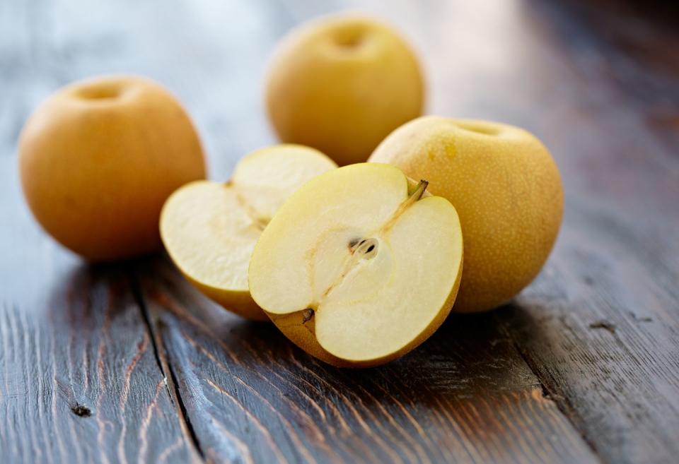 <p>One large Asian pear has a whopping 10 grams of cholesterol-lowering <a href="https://www.prevention.com/food-nutrition/a20516445/high-fiber-diet-plan/" rel="nofollow noopener" target="_blank" data-ylk="slk:fiber;elm:context_link;itc:0;sec:content-canvas" class="link ">fiber</a>, about 40 percent of your daily need. Serve by dicing it into a salad of Boston lettuce, crumbled goat cheese, walnuts, and mandarin oranges. Or make it a dessert: Add peeled and cored pears to a saucepan with one cup white wine, one teaspoon honey, one teaspoon grated fresh ginger, and enough water to cover the pears. Cover and simmer 40 minutes or until pears are soft.</p>