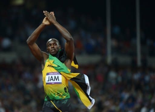 Jamaican sprint king Usain Bolt celebrates after winning the men's 4x100m relay final at the London Olympics on August 11. Negotiations are underway for the cricket-mad Bolt to play in Australia's Twenty20 Big Bash League, with Shane Warne leading the campaign to bring him to Melbourne