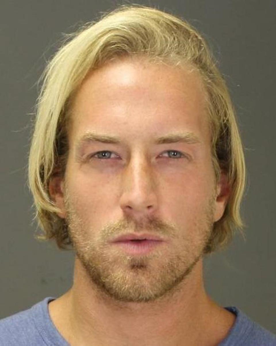 This Sept. 2014 file photo provided by the Suffolk County District Attorney's Office shows Thomas Gilbert Jr., after his arrest on Sept. 18, 2014 in the town of Southampton, N.Y., on a misdemeanor charge.