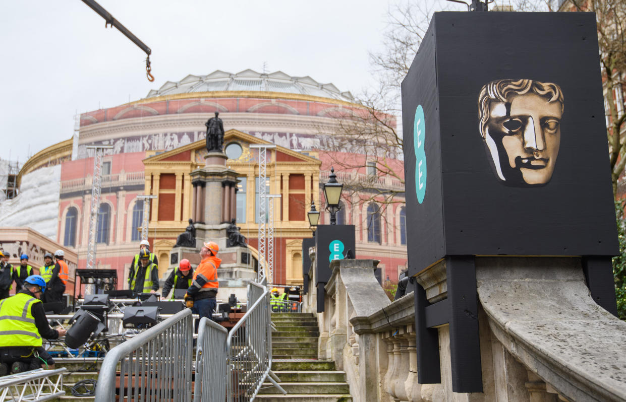 Setup of the red carpet for the BAFTA Film Awards begins at the Royal Albert Hall in London, where they will be held on Sunday. (Photo by Matt Crossick/PA Images via Getty Images)