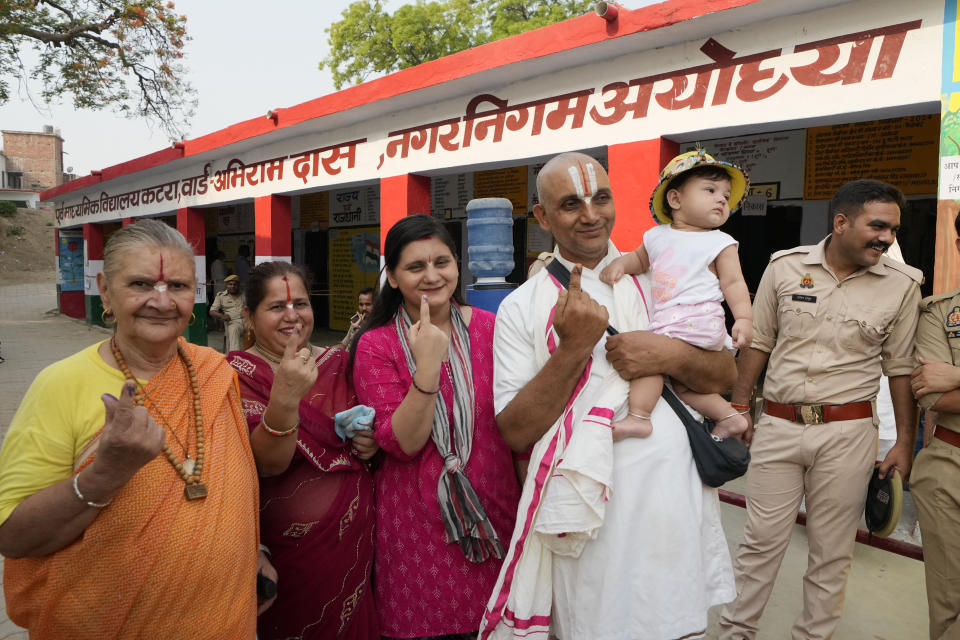 People display indelible ink mark on their fingers after casting their votes during the fifth phase of general election, in Ayodhya , India, Monday, May 20, 2024. The seven phase staggered election will run until June 1 before votes are counted on June 4. Almost 970 million voters will cast their ballots in this election, more than 10% of the world’s population. (AP Photo/Rajesh Kumar Singh)